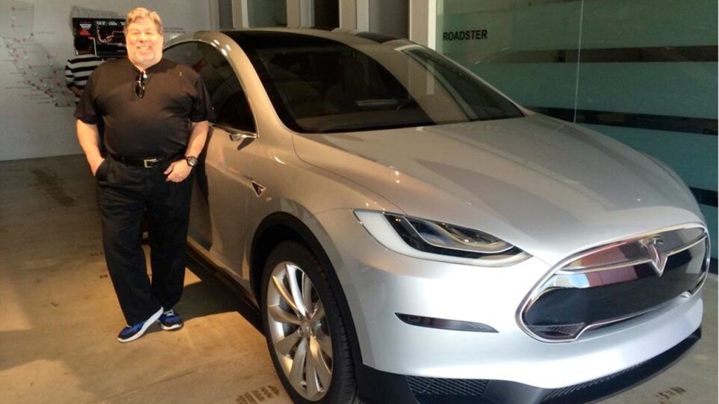 Steve Wozniak standing next to Tesla